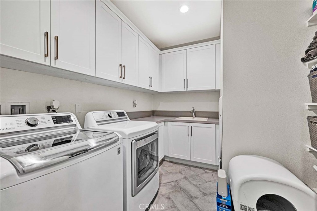 1270 Providence Loop Placentia, CA 92870 - Photo 38 of 59 a utility room with dryer and washer