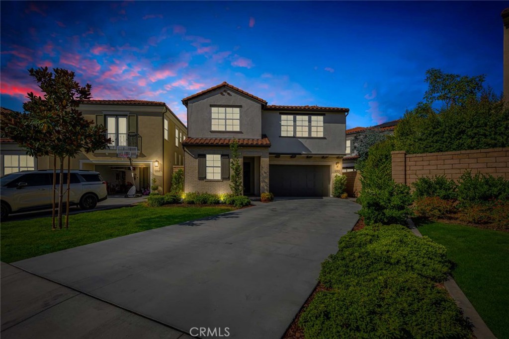 1270 Providence Loop Placentia, CA 92870 - Photo 53 of 59 a front view of a house with a garden