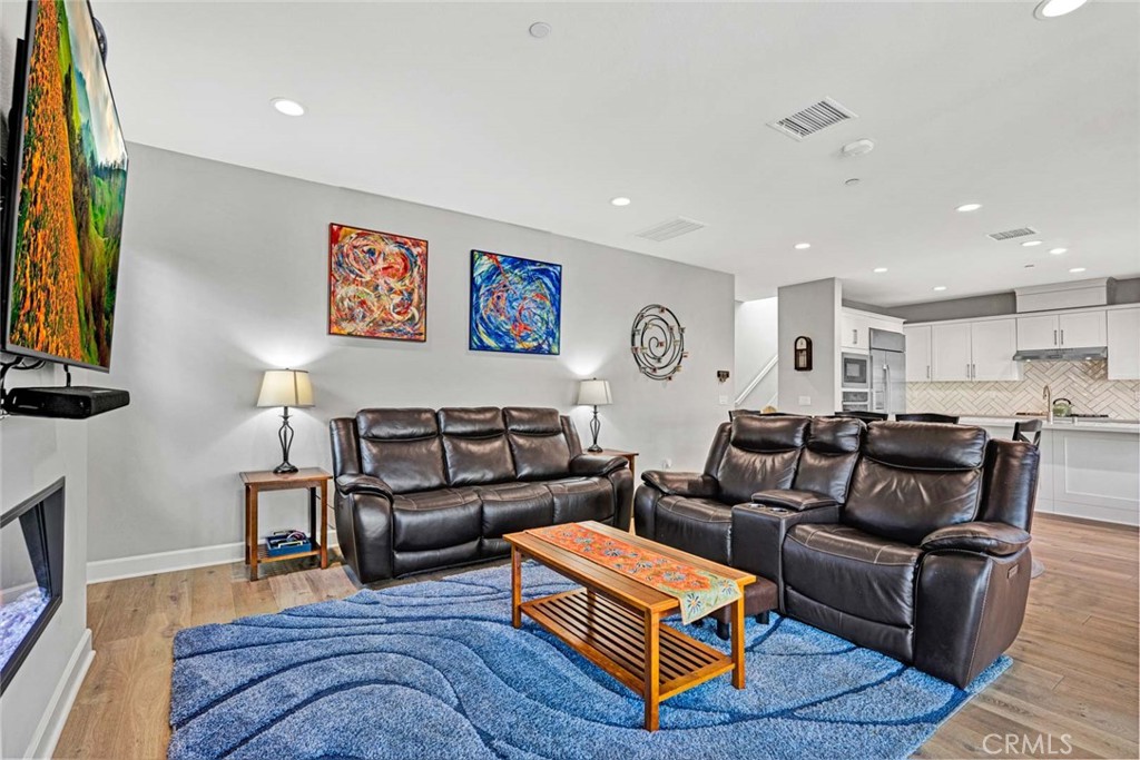 1270 Providence Loop Placentia, CA 92870 - Photo 7 of 59 a living room with furniture and a flat screen tv