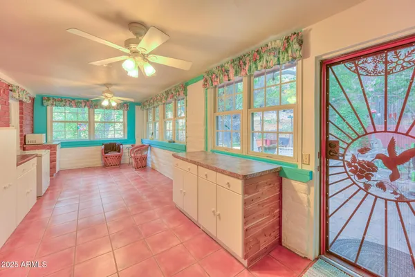 a backyard of a house with seating space