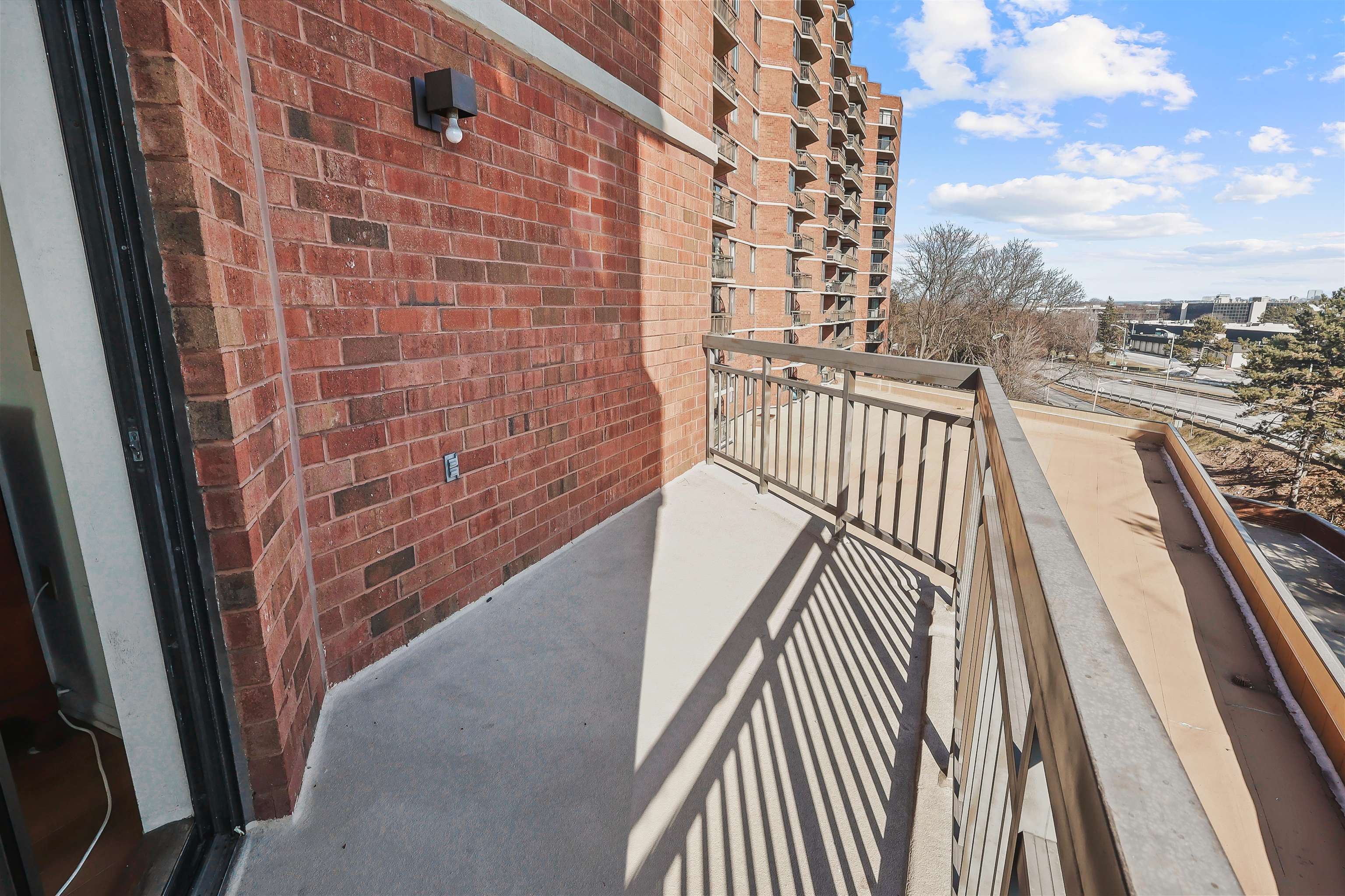 401 Harmon Cove Tower, Unit 401 Secaucus, NJ 07094 - Photo 18 of 49 a view of balcony with wooden floor