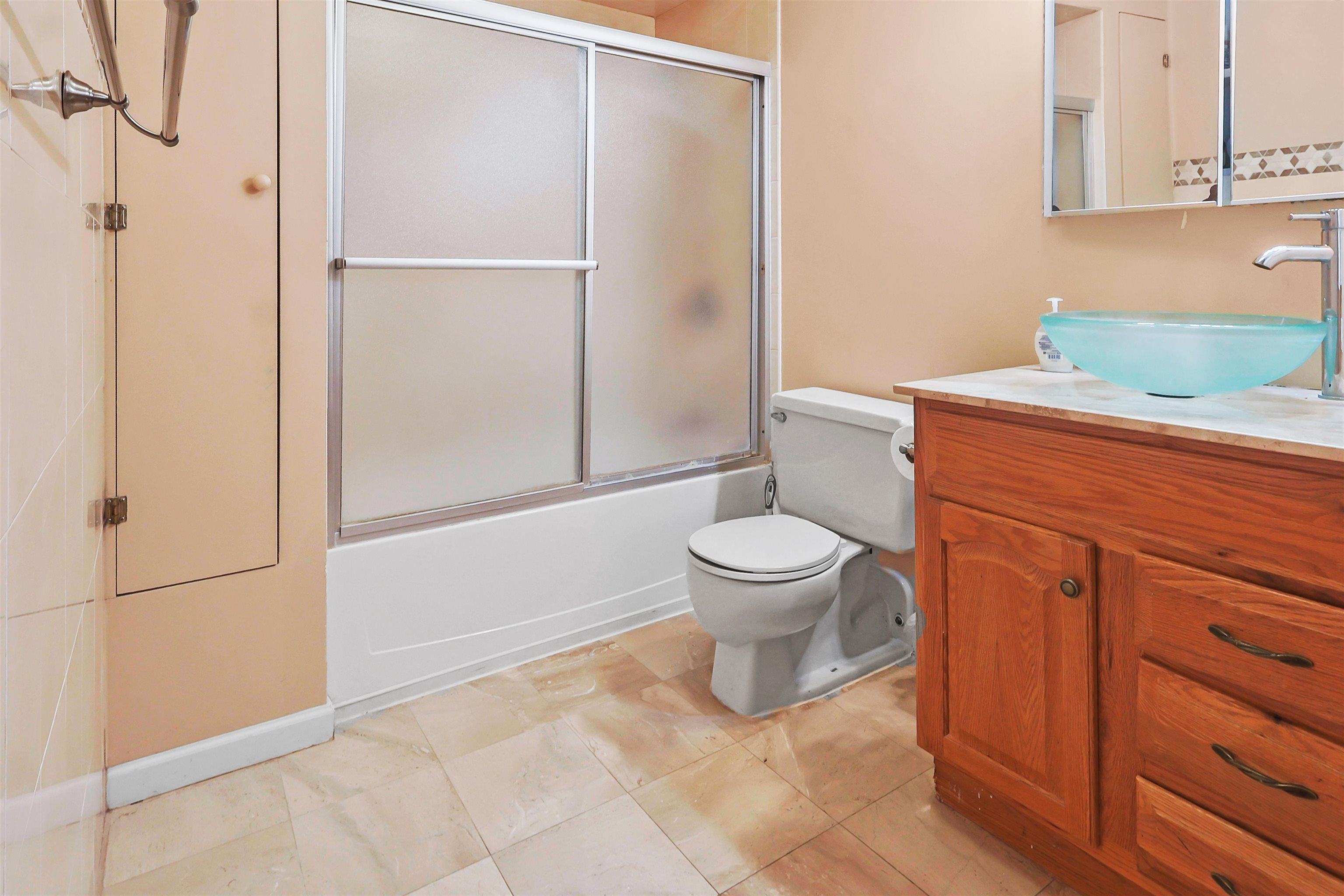 401 Harmon Cove Tower, Unit 401 Secaucus, NJ 07094 - Photo 26 of 49 a bathroom with a toilet and a shower