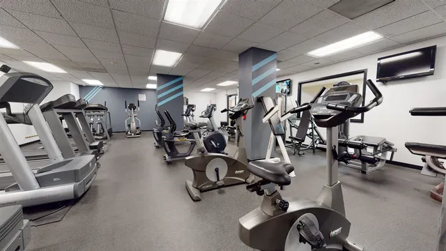 a view of a room with gym equipment