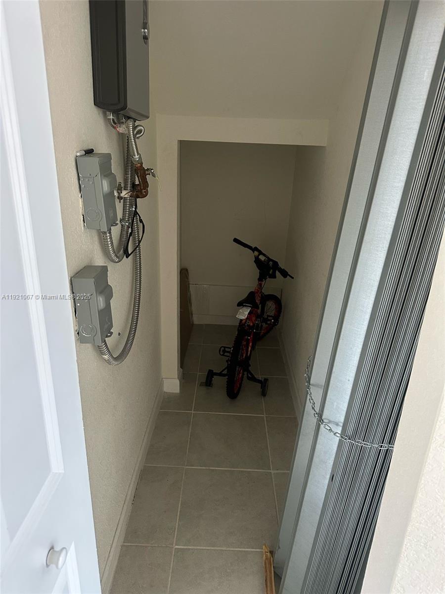 3302 West 114th Terrace Hialeah, FL 33018 - Photo 5 of 30 a bathroom with a bath tub and a shower