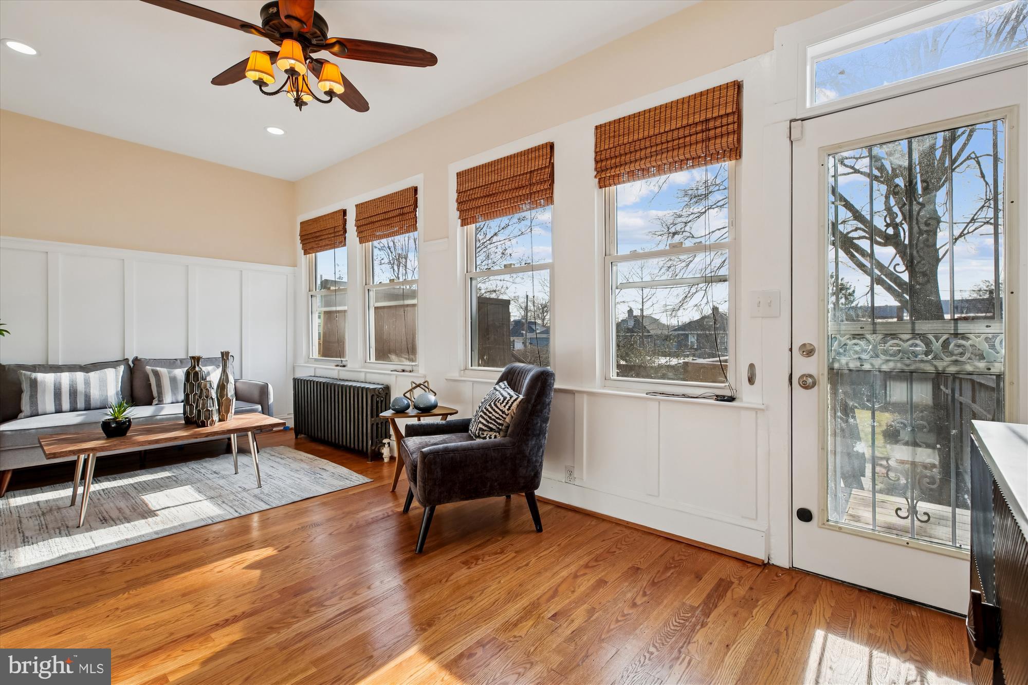 1412 Allison Street Northwest Washington, DC 20011 - Photo 16 of 62 a living room with furniture and floor to ceiling windows
