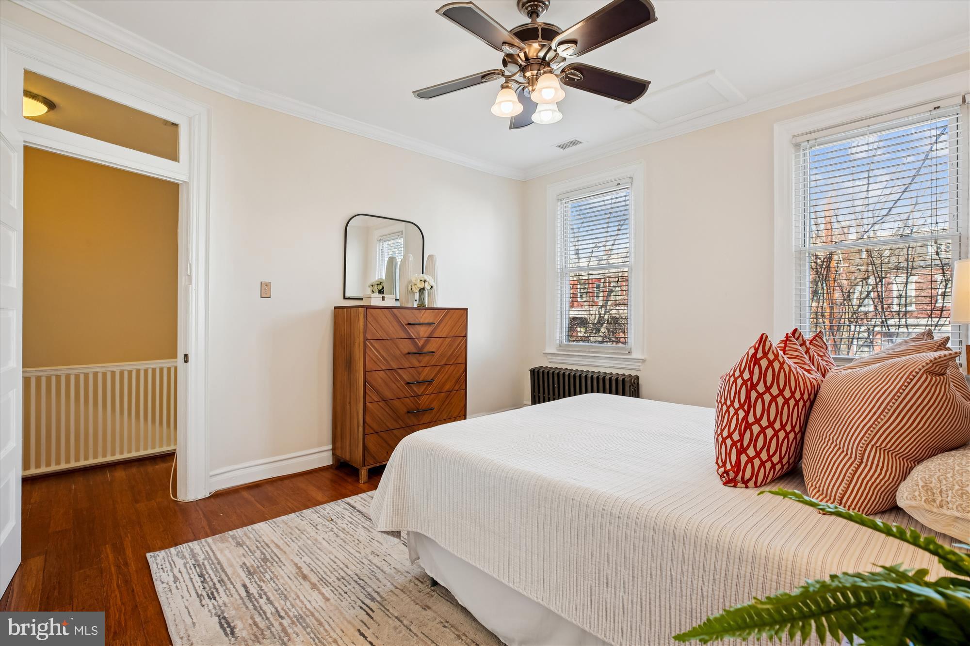 1412 Allison Street Northwest Washington, DC 20011 - Photo 23 of 62 a bedroom with a bed and wooden floor