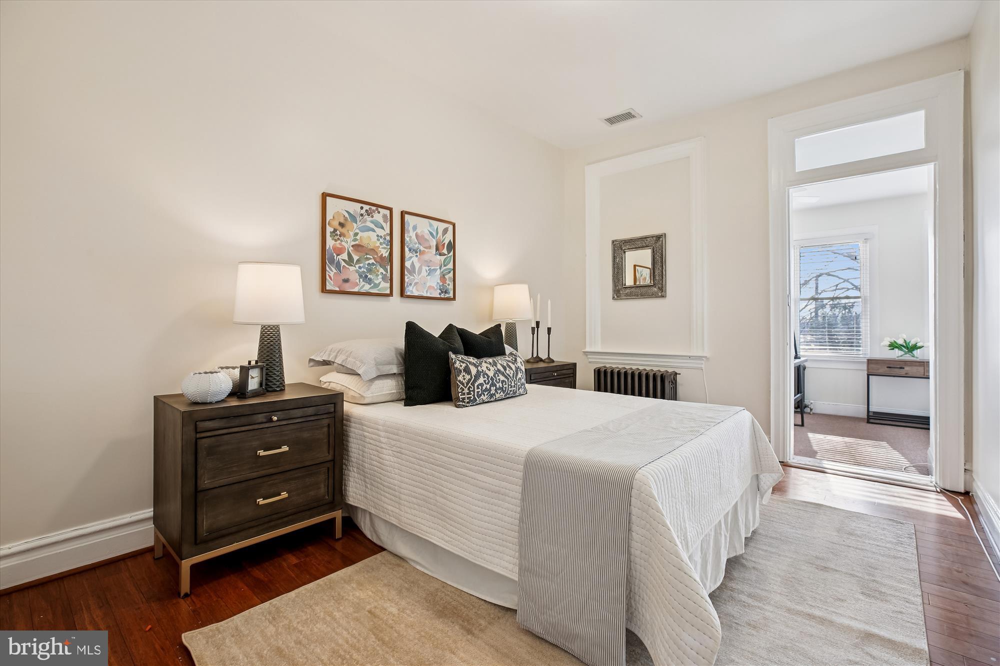 1412 Allison Street Northwest Washington, DC 20011 - Photo 27 of 62 a bedroom with a bed and a television