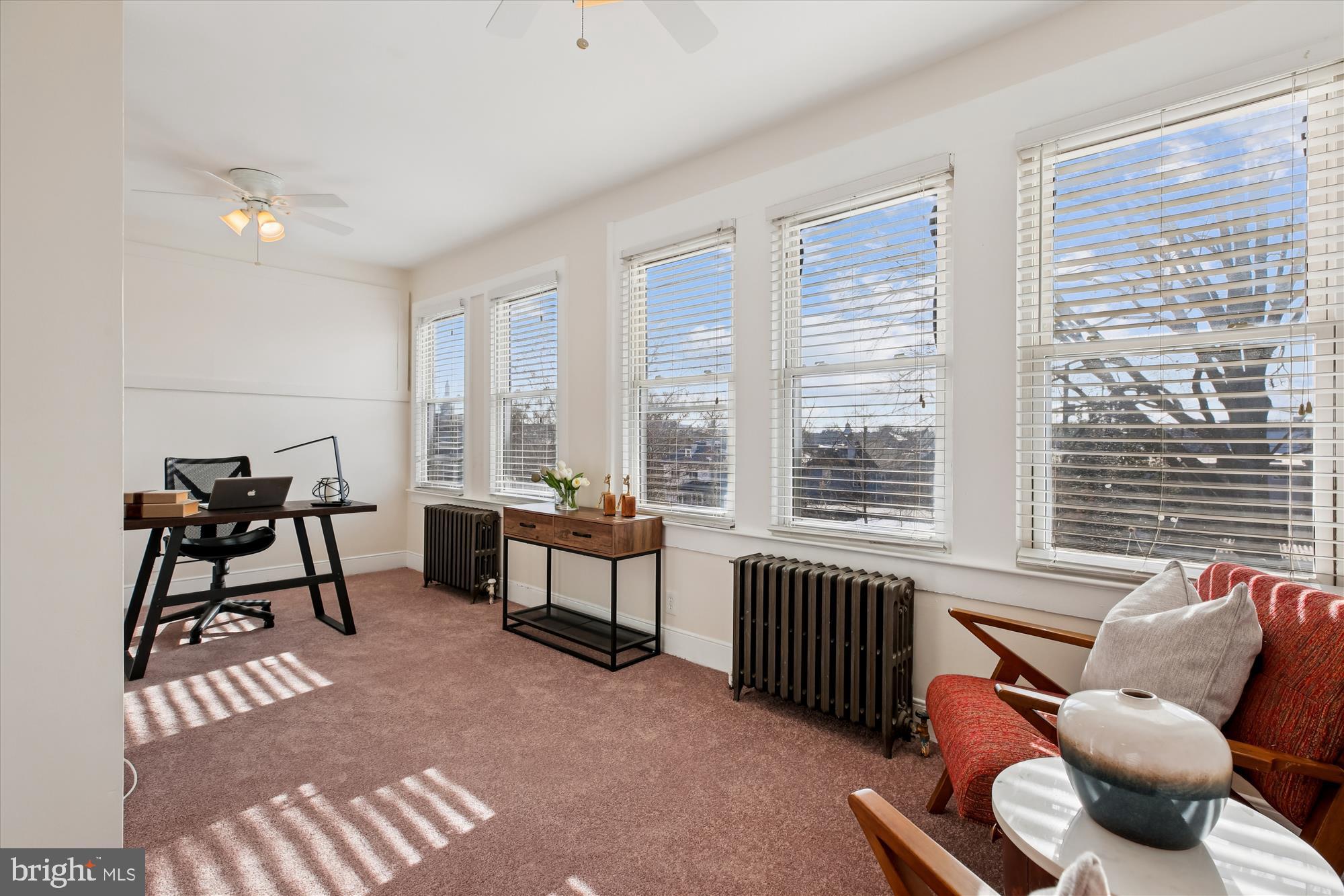 1412 Allison Street Northwest Washington, DC 20011 - Photo 34 of 62 a living room with furniture and a floor to ceiling window