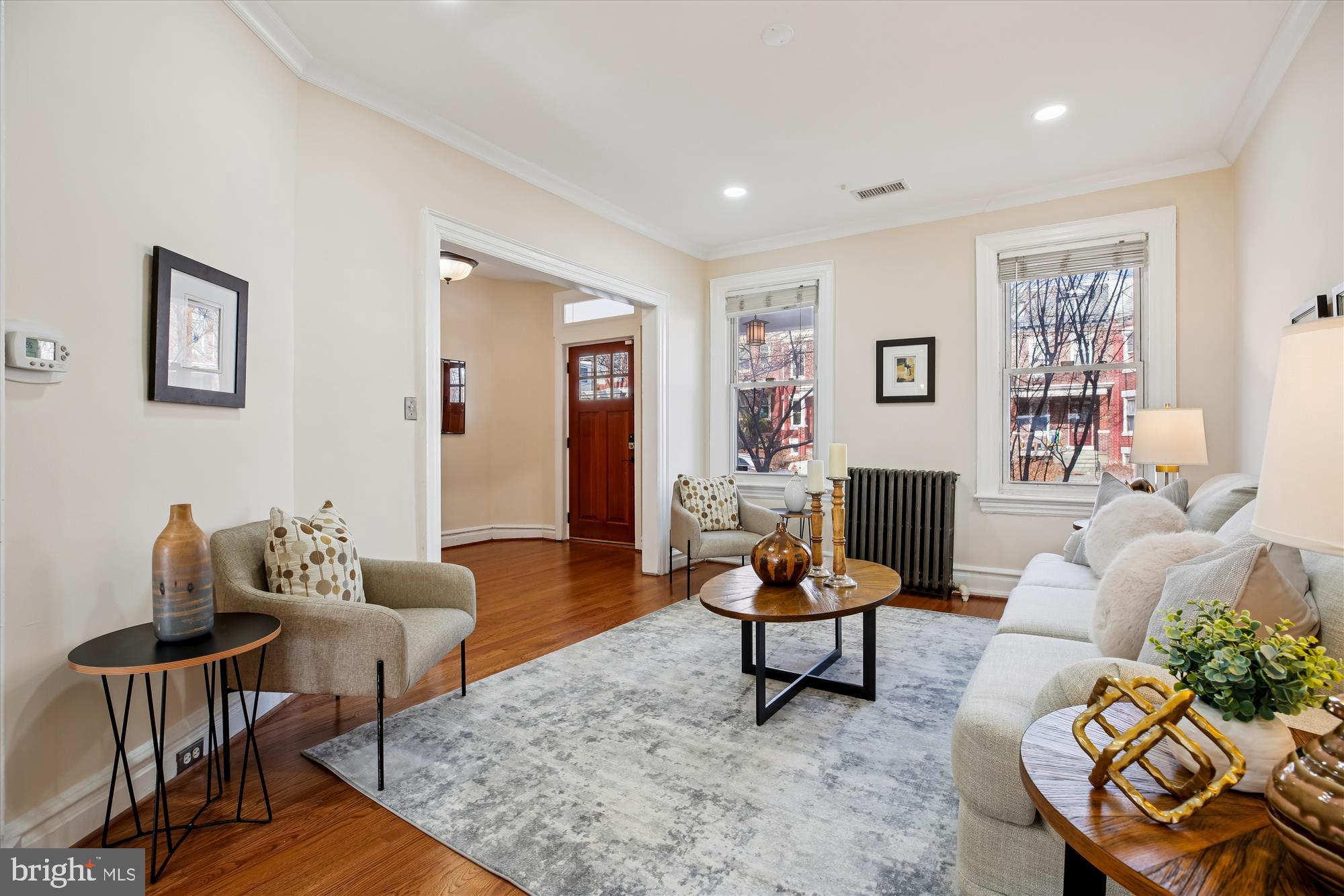 1412 Allison Street Northwest Washington, DC 20011 - Photo 4 of 62 a living room with furniture and a potted plant