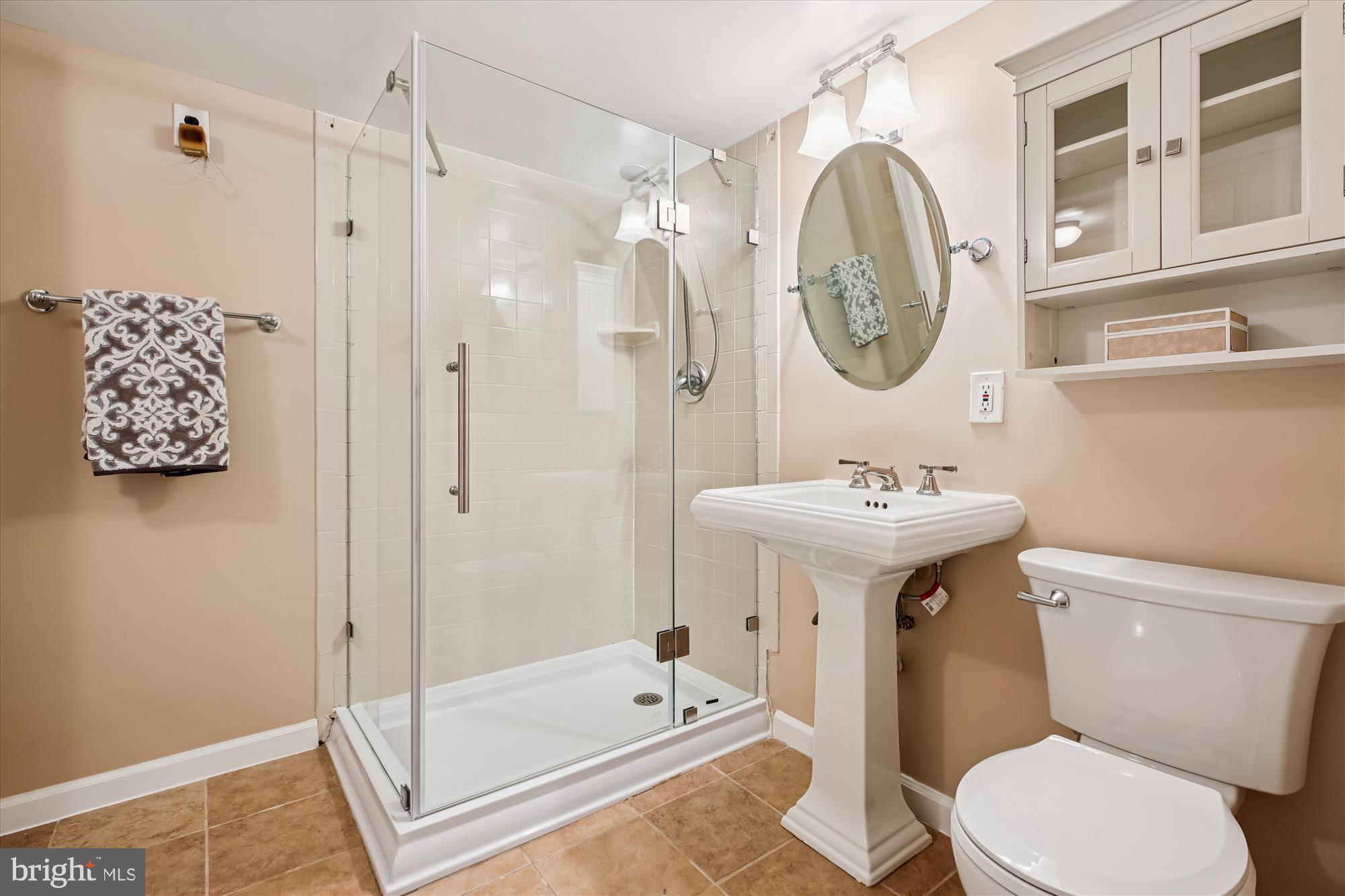 1412 Allison Street Northwest Washington, DC 20011 - Photo 45 of 62 a bathroom with a toilet a sink and a shower
