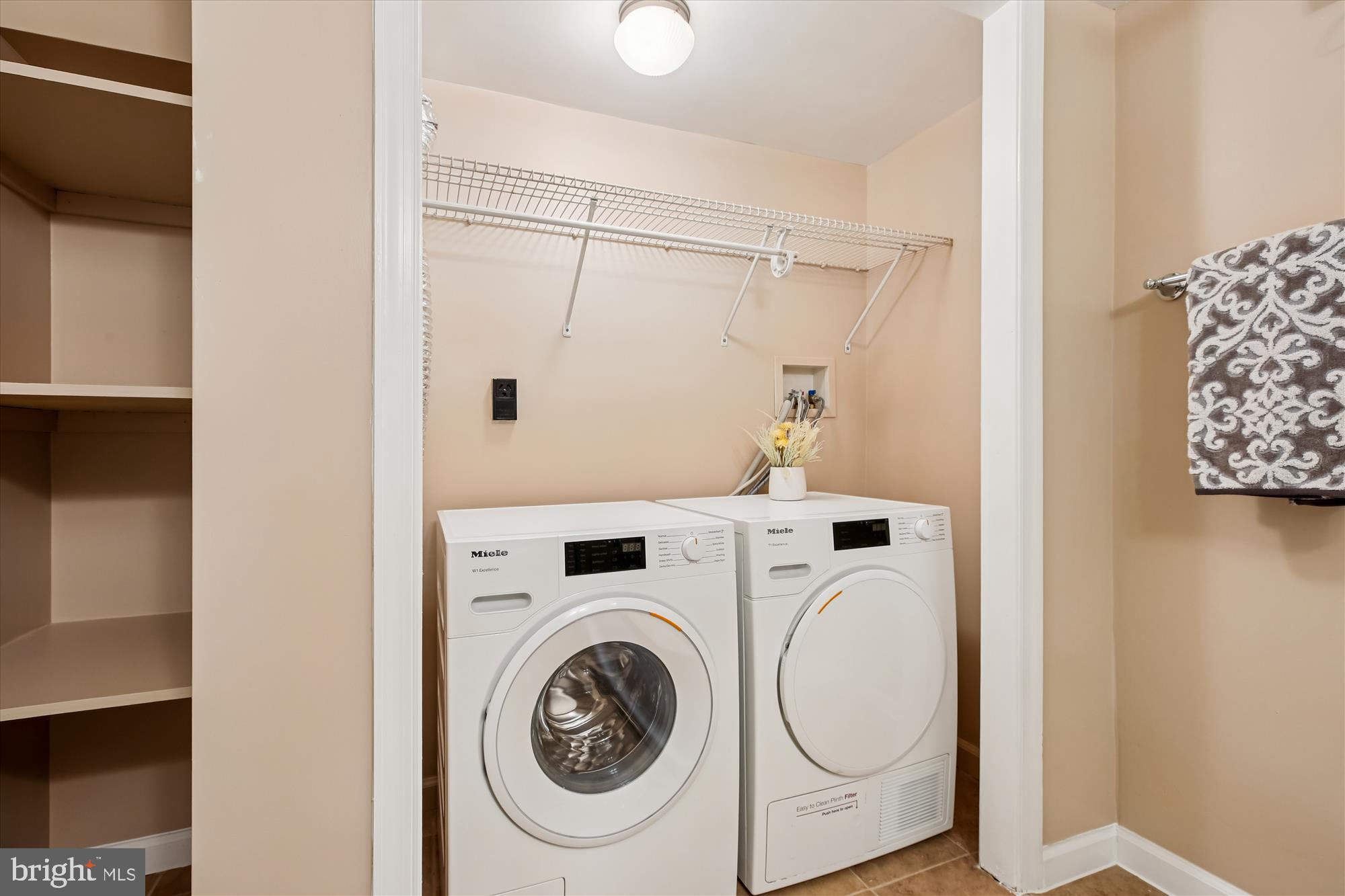 1412 Allison Street Northwest Washington, DC 20011 - Photo 46 of 62 a utility room with dryer and washer