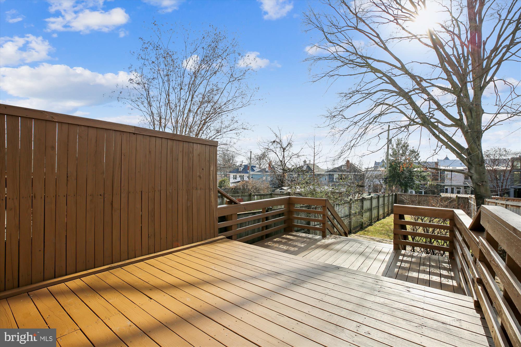1412 Allison Street Northwest Washington, DC 20011 - Photo 50 of 62 a view of balcony with wooden floor and bench