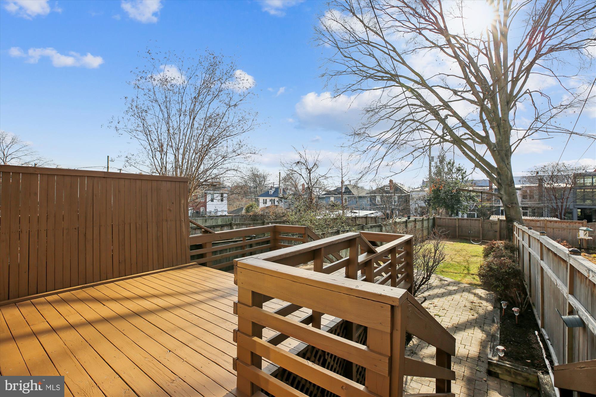 1412 Allison Street Northwest Washington, DC 20011 - Photo 51 of 62 a view of a roof deck with couches and wooden fence