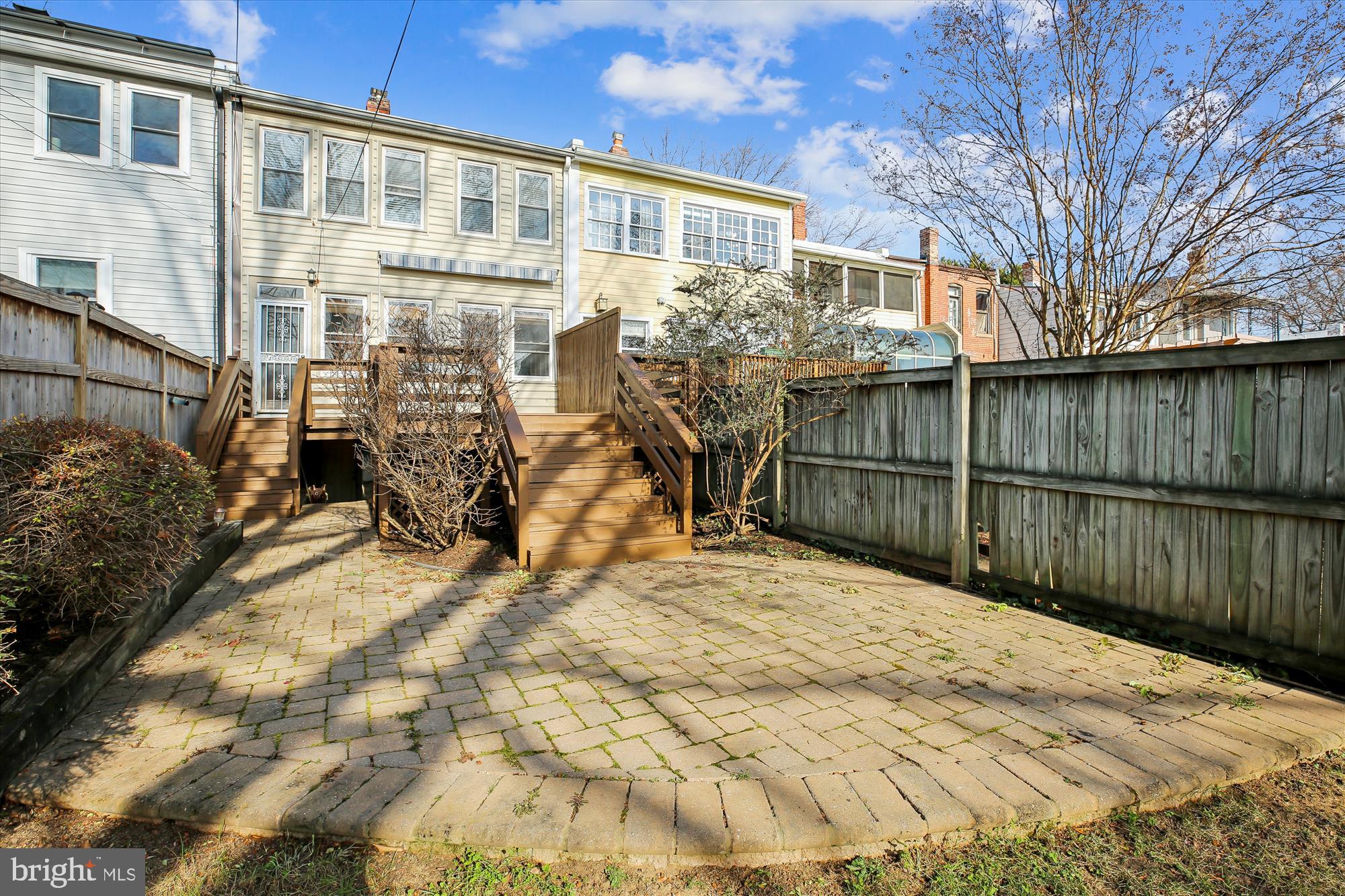 1412 Allison Street Northwest Washington, DC 20011 - Photo 52 of 62 a view of a house with a wooden fence