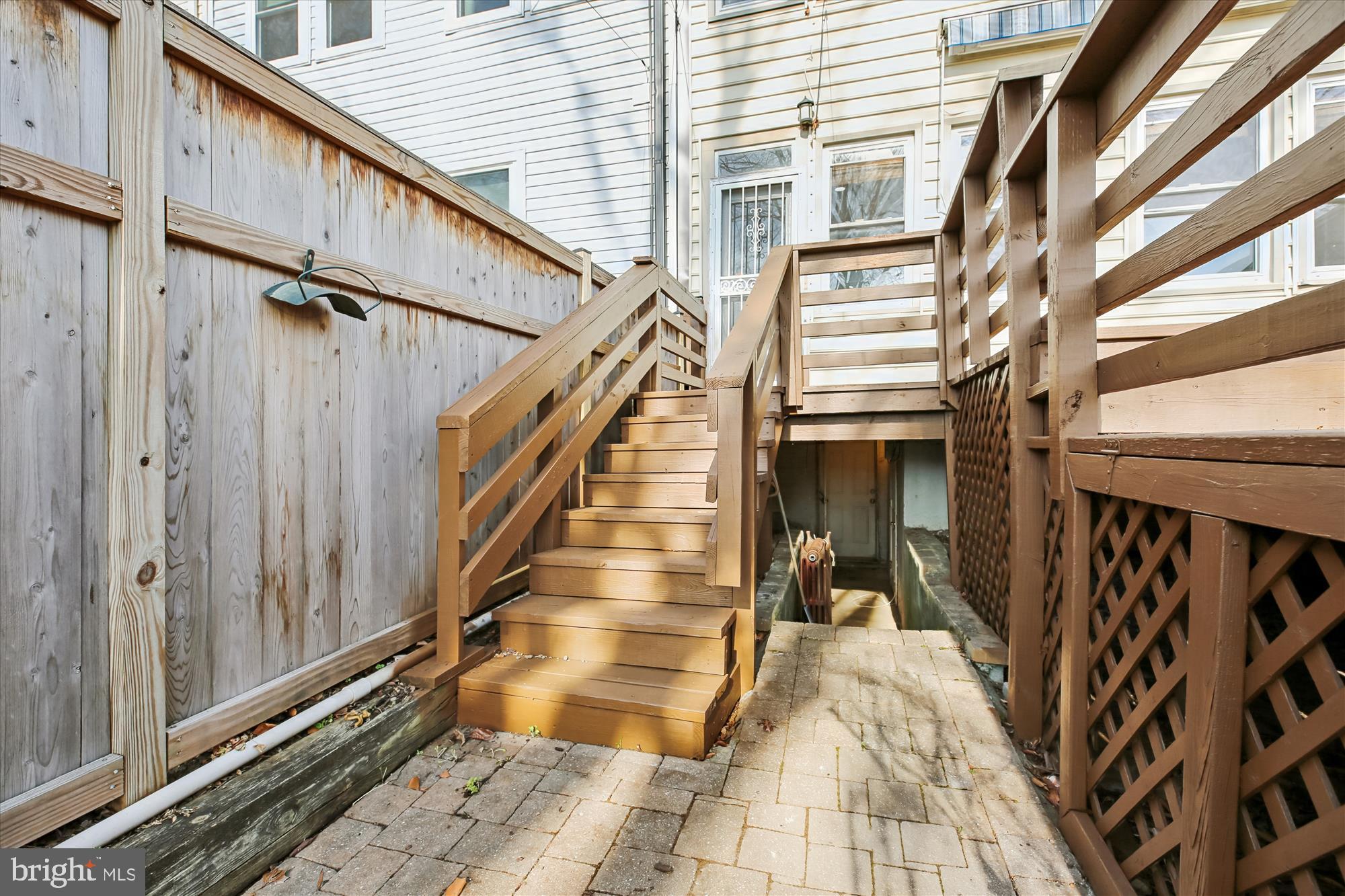 1412 Allison Street Northwest Washington, DC 20011 - Photo 53 of 62 a view of a balcony with wooden floor and stairs