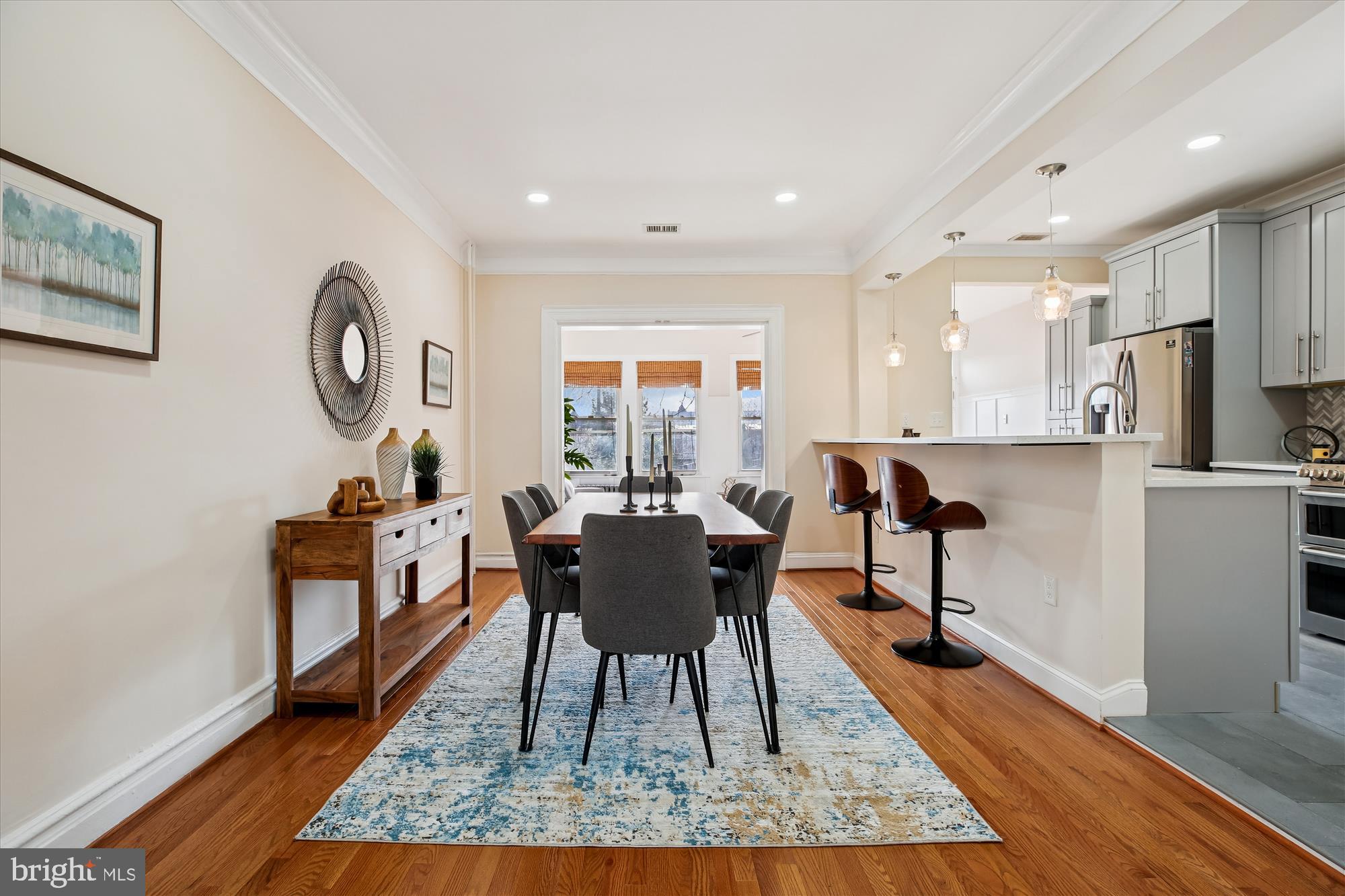 1412 Allison Street Northwest Washington, DC 20011 - Photo 9 of 62 a dining room with wooden floor and a rug