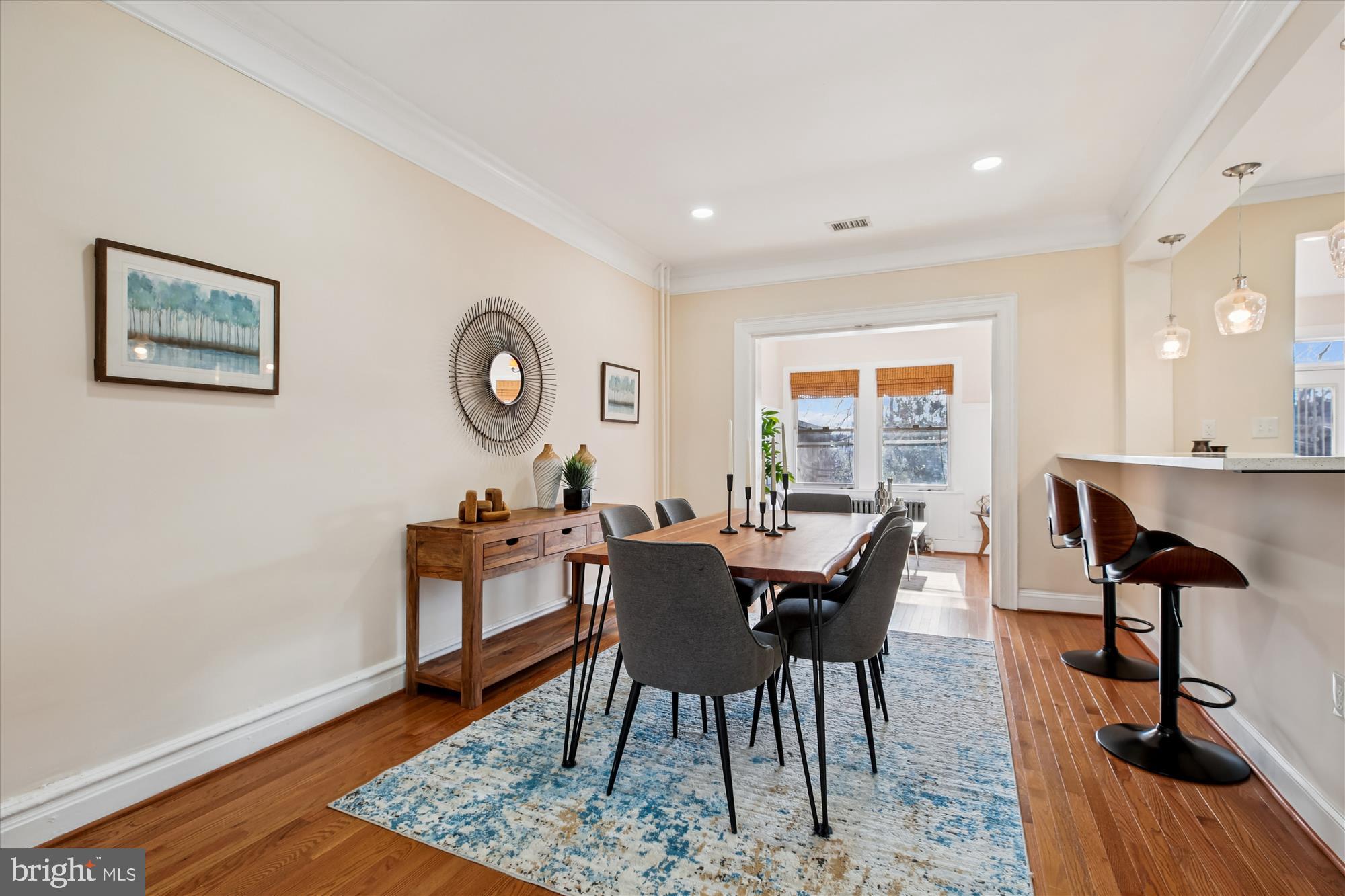 1412 Allison Street Northwest Washington, DC 20011 - Photo 10 of 62 a view of a dining room with furniture and wooden floor