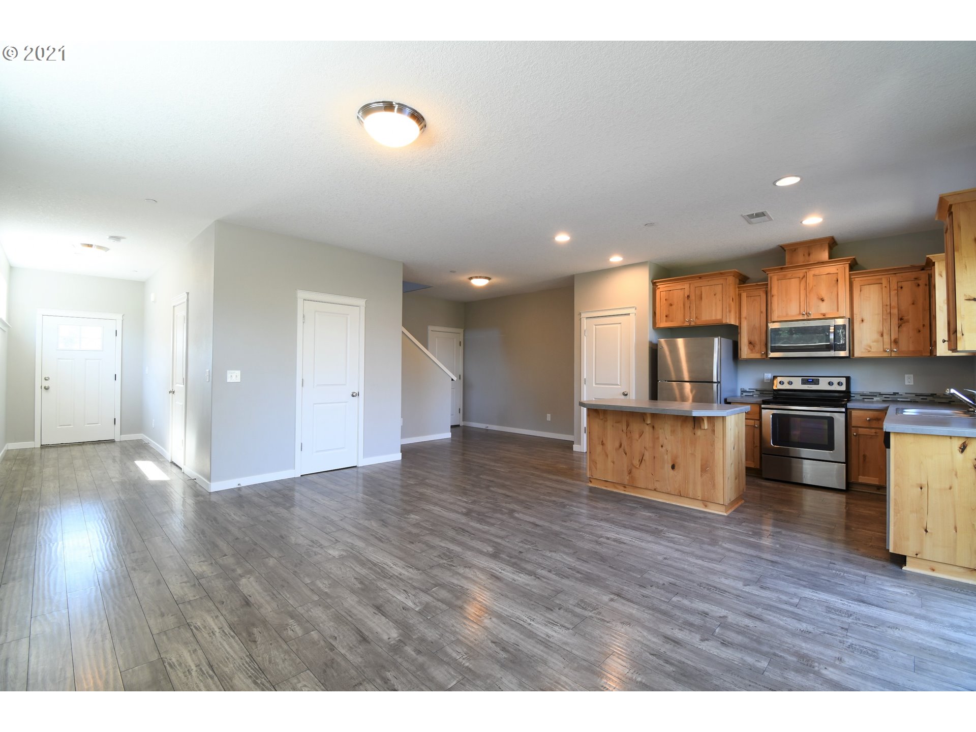 4361 North 2nd Way Ridgefield, WA 98642 - Photo 2 of 19 a view of kitchen with sink and wooden floor