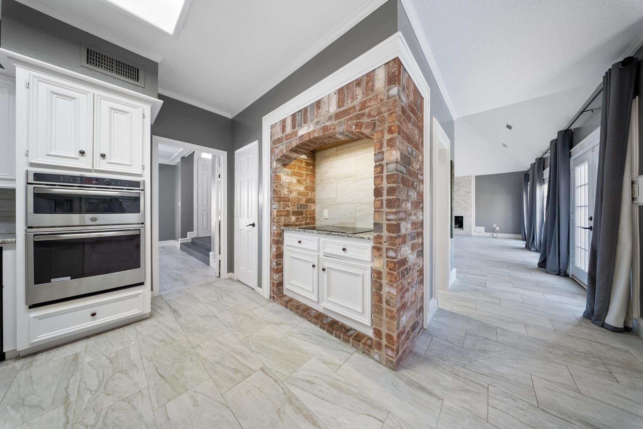11626 Taos Lane Houston, TX 77070 - Photo 15 of 32 a bathroom with a double vanity sink and a mirror