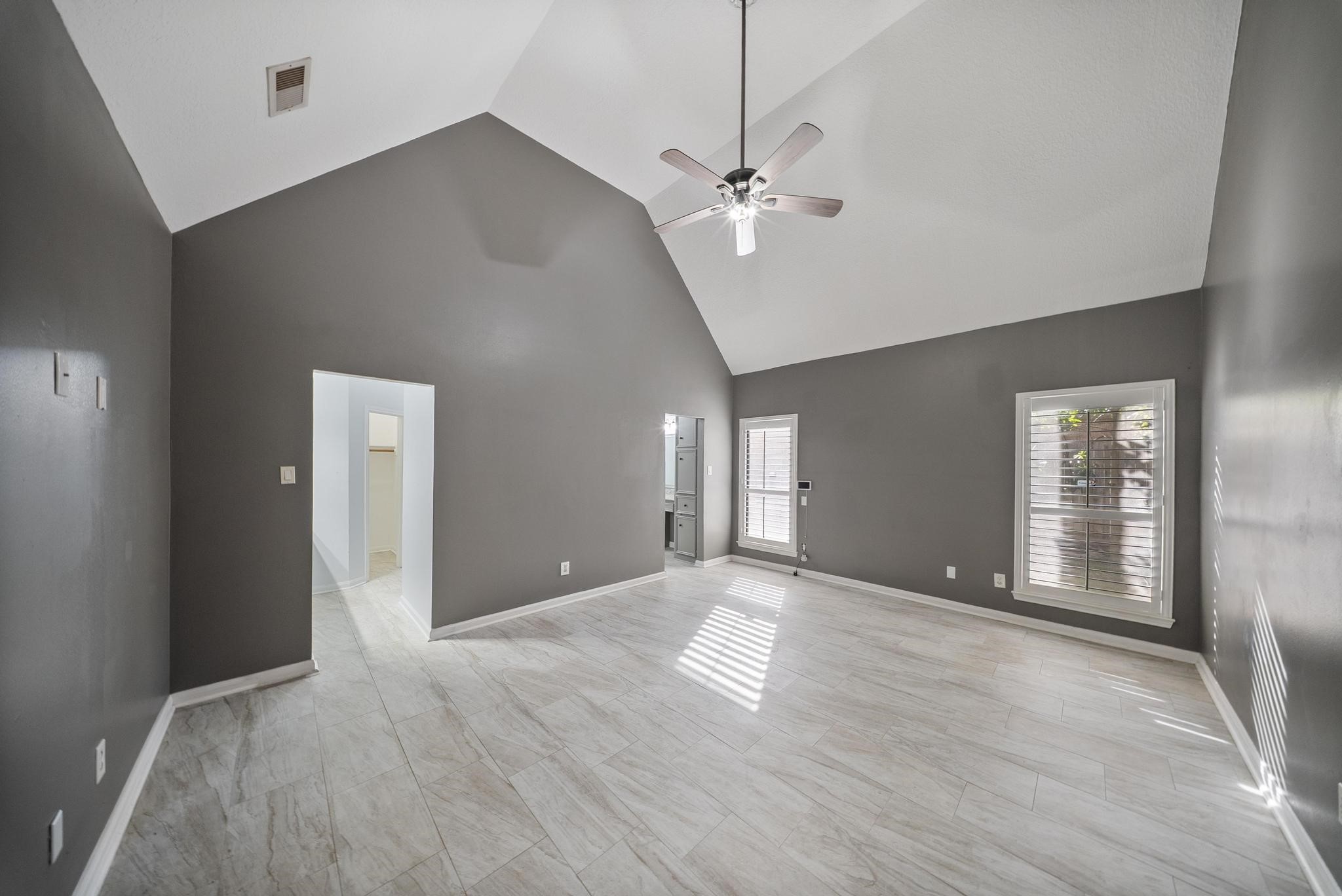 11626 Taos Lane Houston, TX 77070 - Photo 20 of 32 wooden floor in an empty room with a window