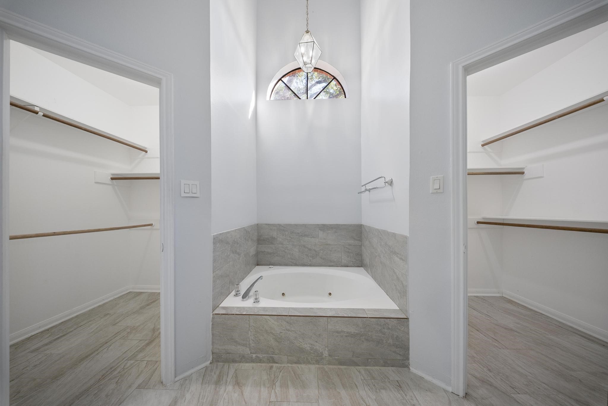11626 Taos Lane Houston, TX 77070 - Photo 22 of 32 a bathroom with a sink and a mirror