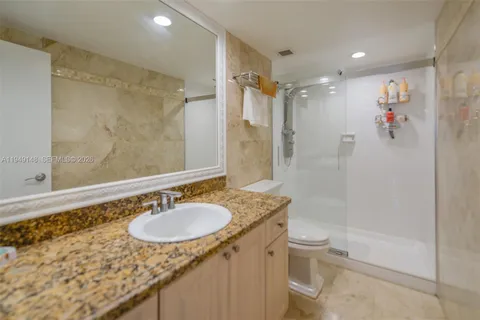 a view of a hallway with a white walls