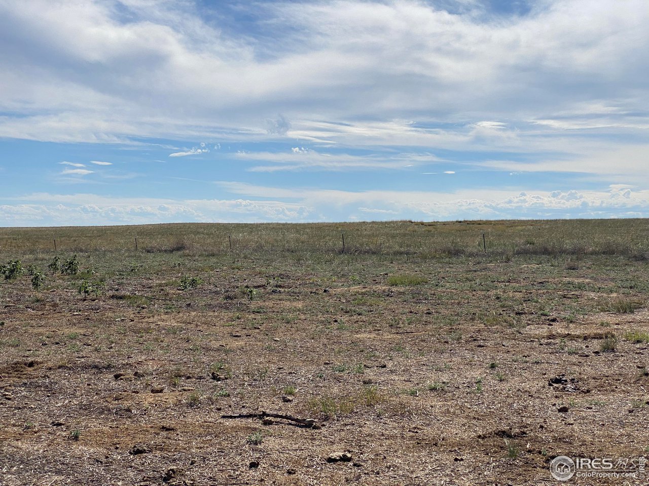 93 Weld County Rd Orchard, Unit TRACT 1 Orchard, CO 80649 - Photo 2 of 6 a view of a field with an ocean