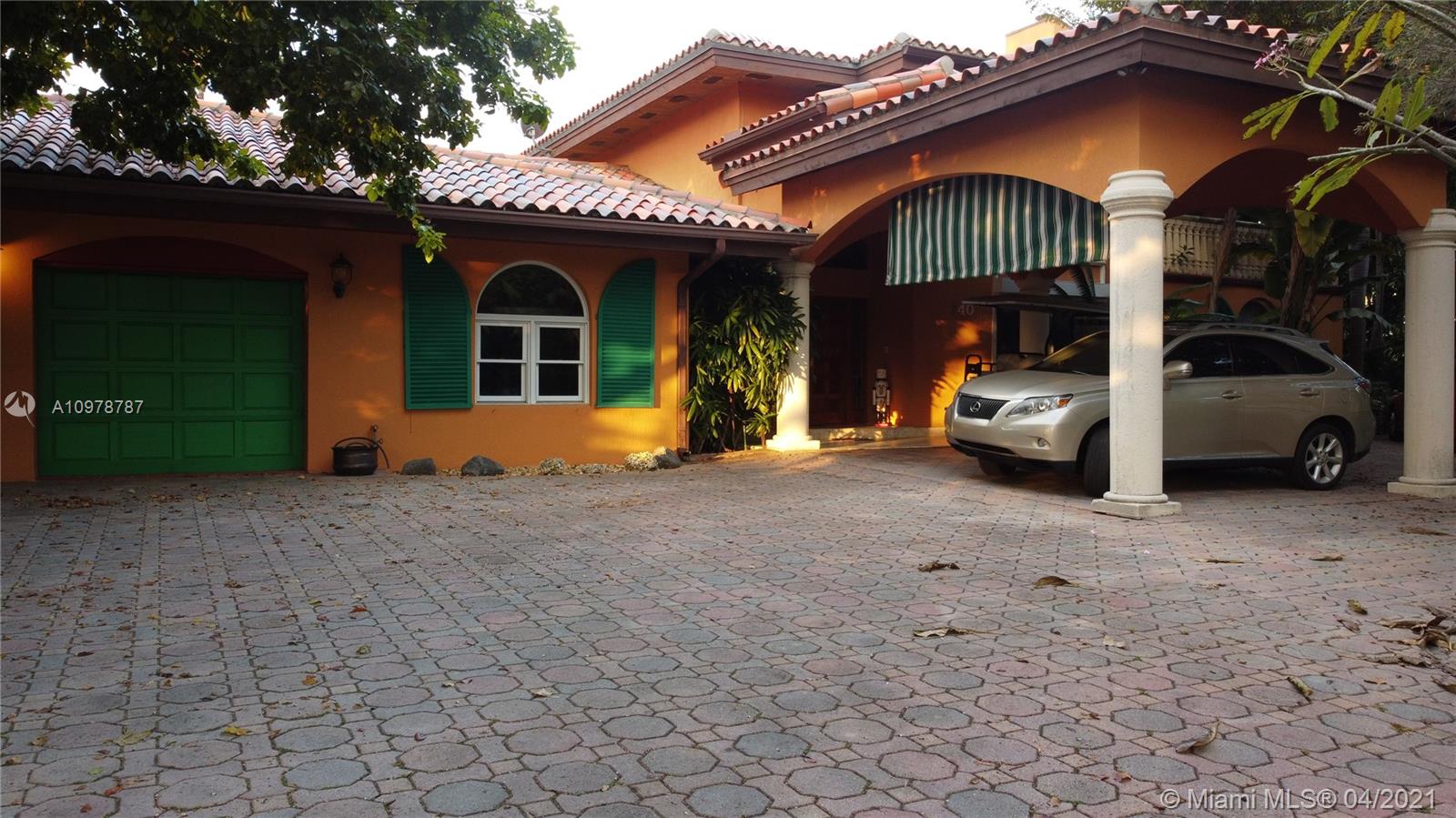 Key Biscayne Key Biscayne, FL 33149 - Photo 2 of 20 a view of a house with a patio