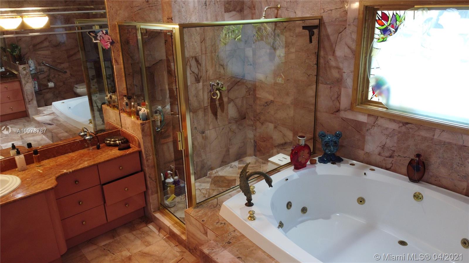 Key Biscayne Key Biscayne, FL 33149 - Photo 11 of 20 a bathroom with a bathtub and a sink