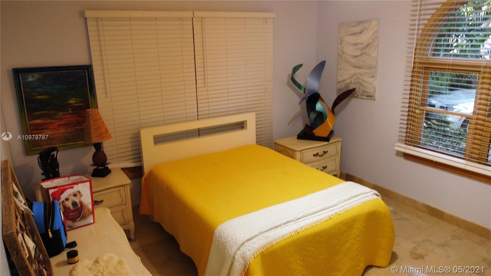 Key Biscayne Key Biscayne, FL 33149 - Photo 13 of 20 a bedroom with a bed and teddy bear on the floor