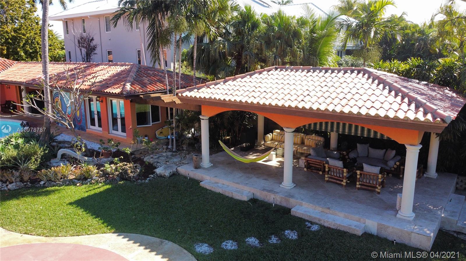 Key Biscayne Key Biscayne, FL 33149 - Photo 15 of 20 a view of a house with backyard and sitting area