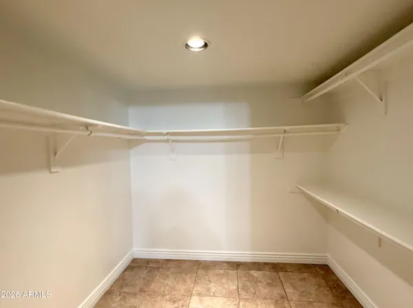 a view of a room with racks on the wall