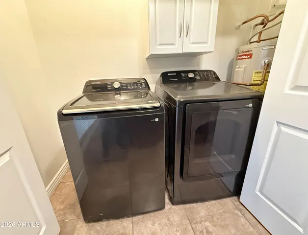 a view of a backyard with sitting area