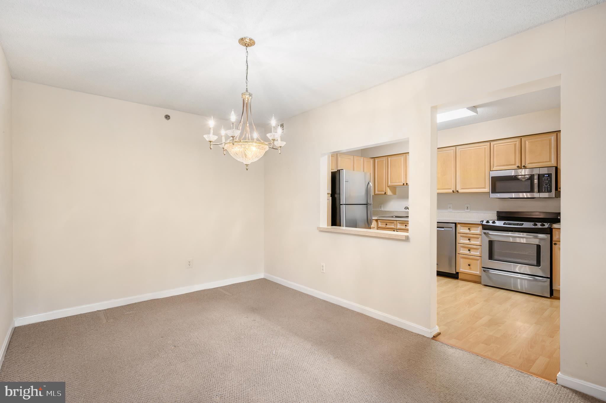 19385 Cypress Ridge Terrace, Unit 519 Leesburg, VA 20176 - Photo 6 of 43 Dining area and Kitchen