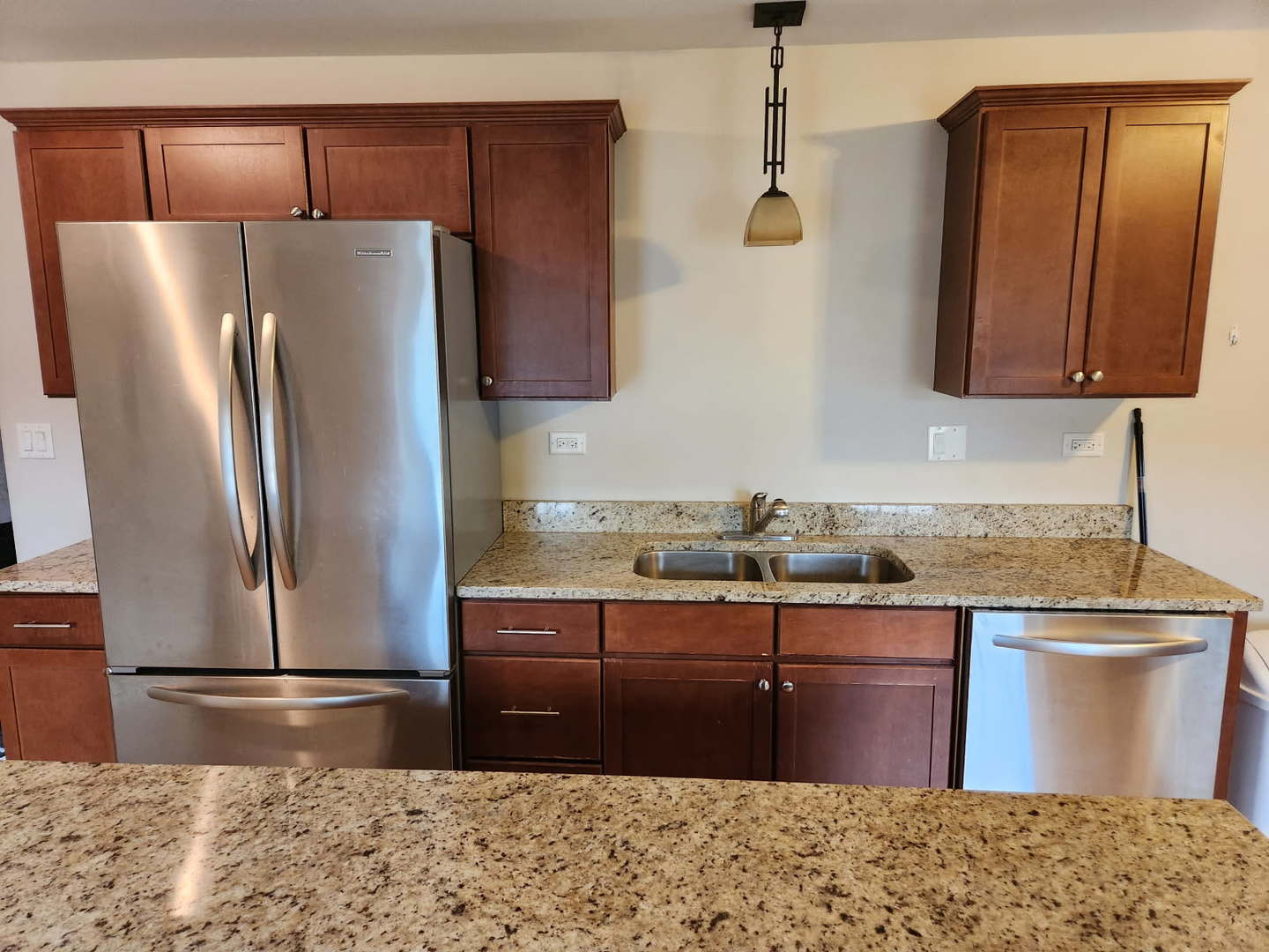 532 Beloit Avenue, Unit 2 Forest Park, IL 60130 - Photo 2 of 12 a kitchen with stainless steel appliances granite countertop a refrigerator and a sink