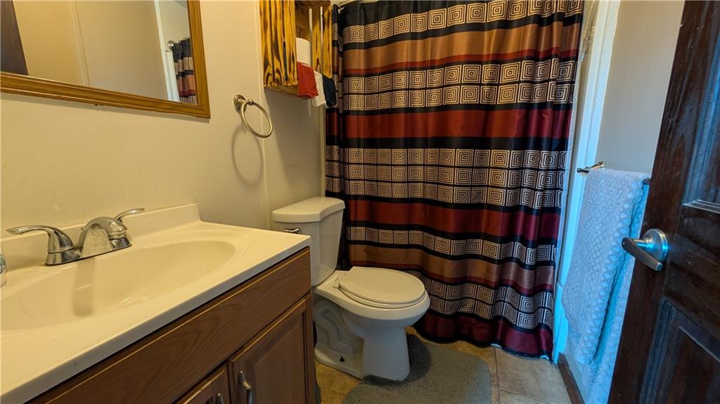 203 Colvin Road Greensboro, PA 15338 - Photo 10 of 20 a bathroom with a sink and toilet