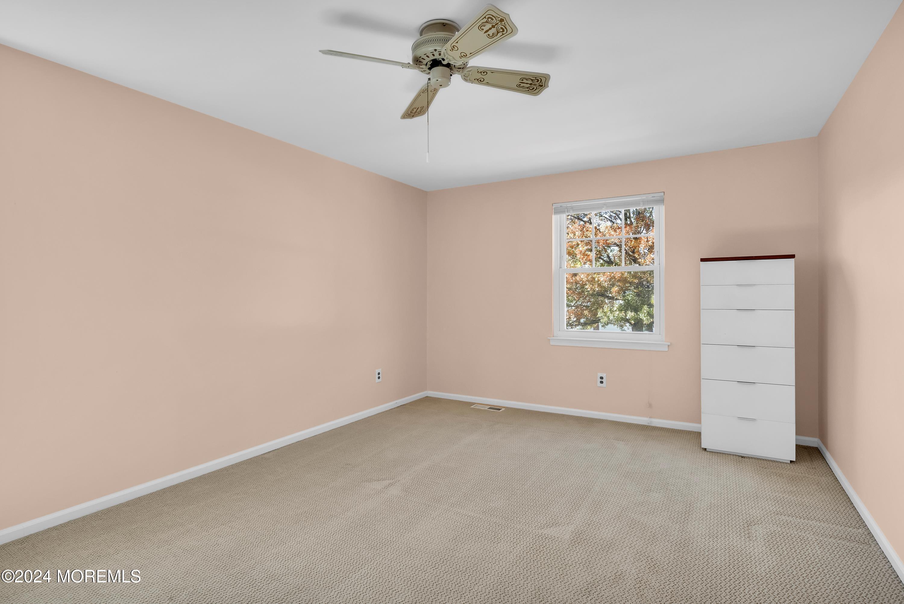 17 Willow Ridge Road Marlton, NJ 08053 - Photo 19 of 36 an empty room with closet and fan