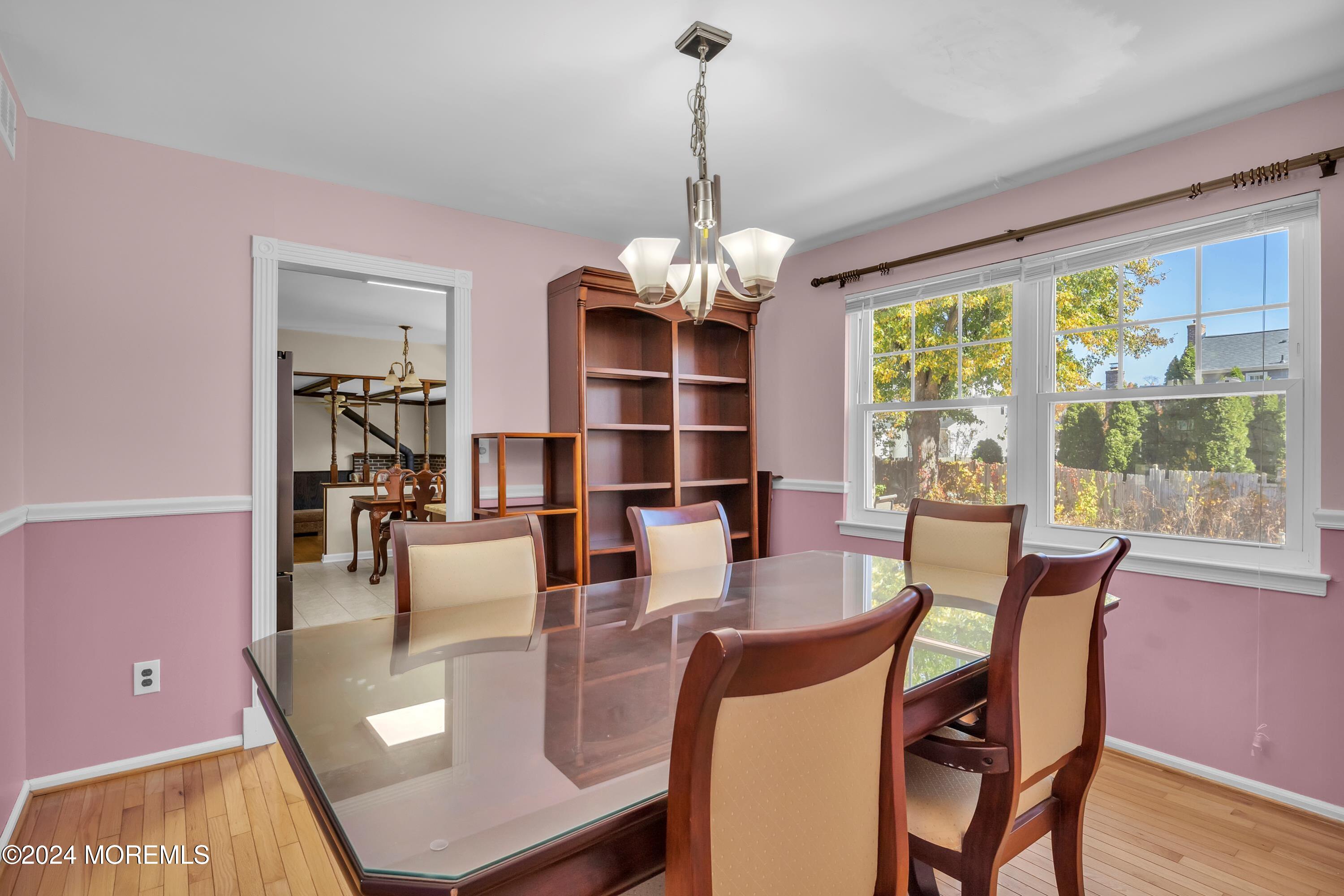 17 Willow Ridge Road Marlton, NJ 08053 - Photo 9 of 36 a dining room with furniture a chandelier and window