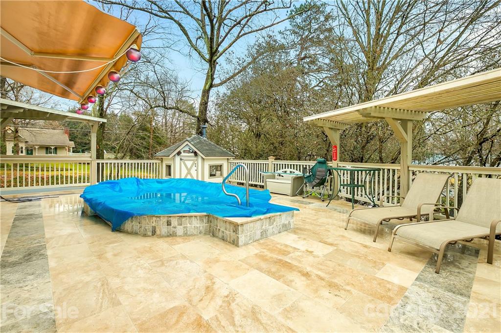 21036 Rio Oro Drive Cornelius, NC 28031 - Photo 24 of 29 a view of backyard with swimming pool and seating space