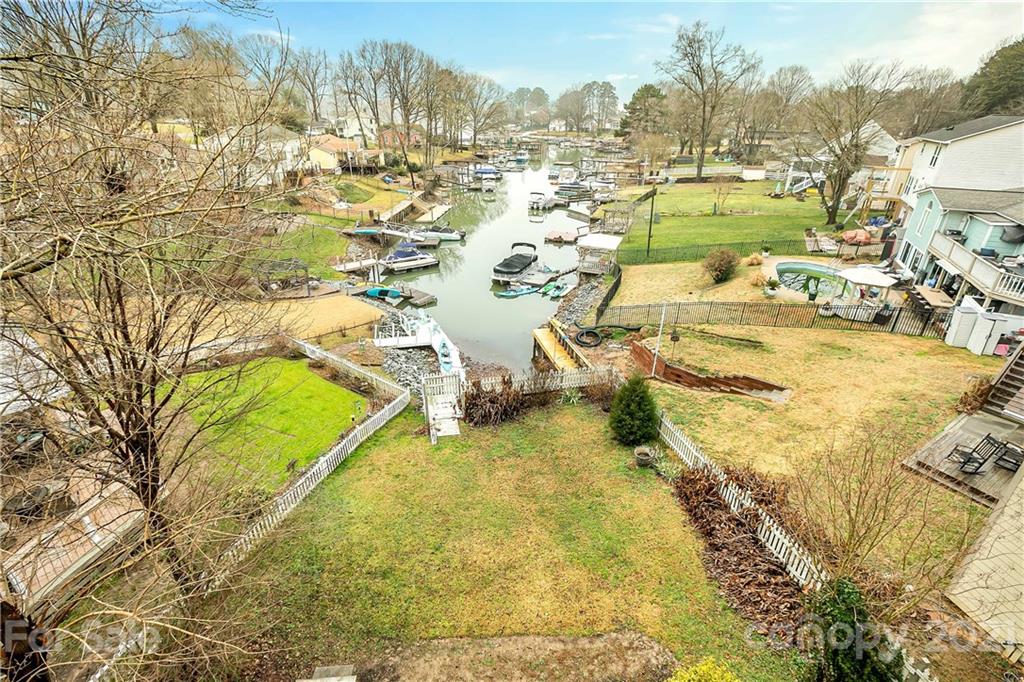 21036 Rio Oro Drive Cornelius, NC 28031 - Photo 27 of 29 a view of a swimming pool with a yard