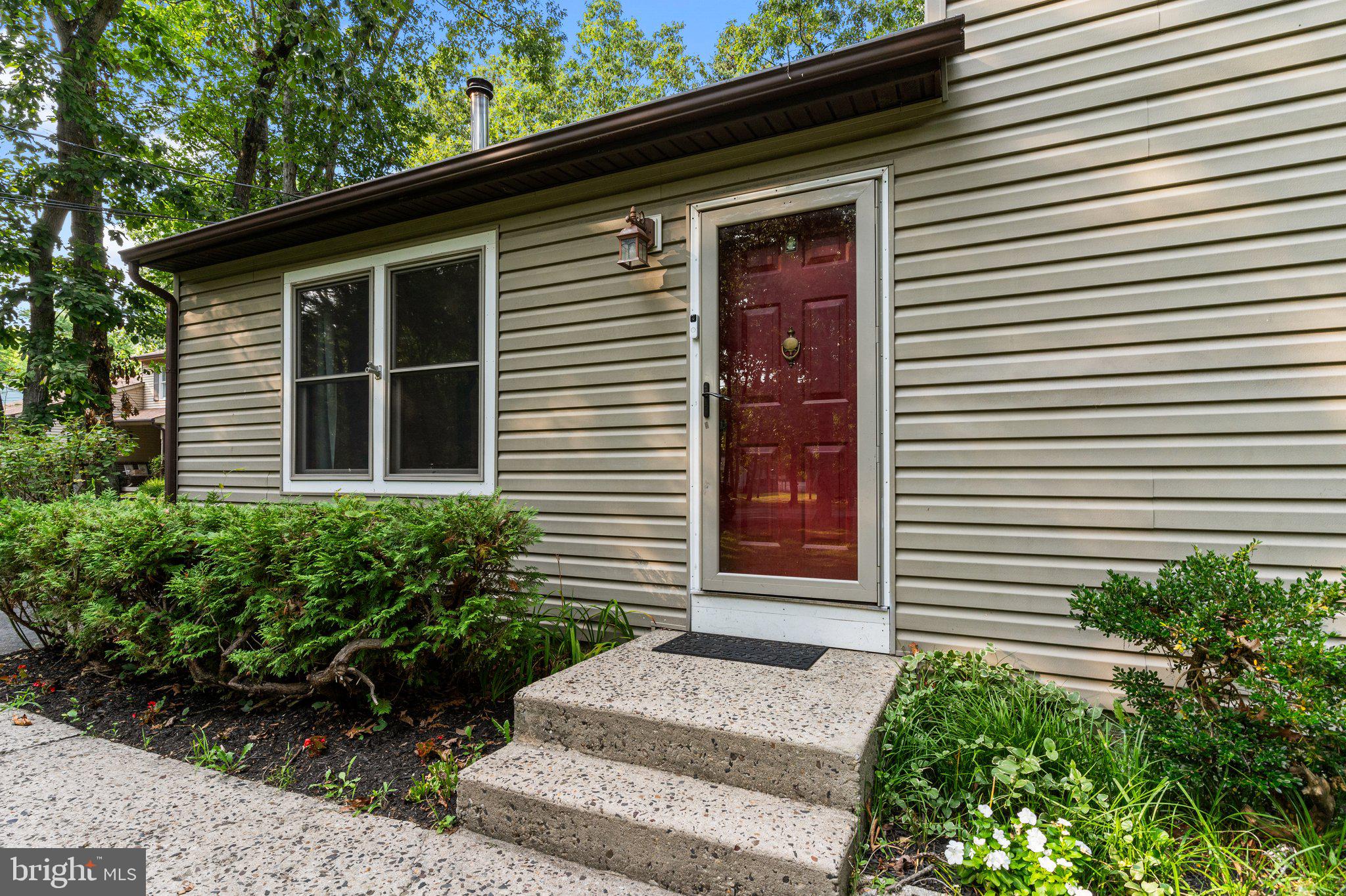 138 Sooy Place Road Tabernacle, NJ 08088 - Photo 5 of 41 a front view of a house with a yard