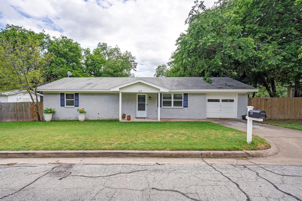 403 McCarty Street Weatherford, TX 76086 - Photo 1 of 1 a front view of a house with a garden
