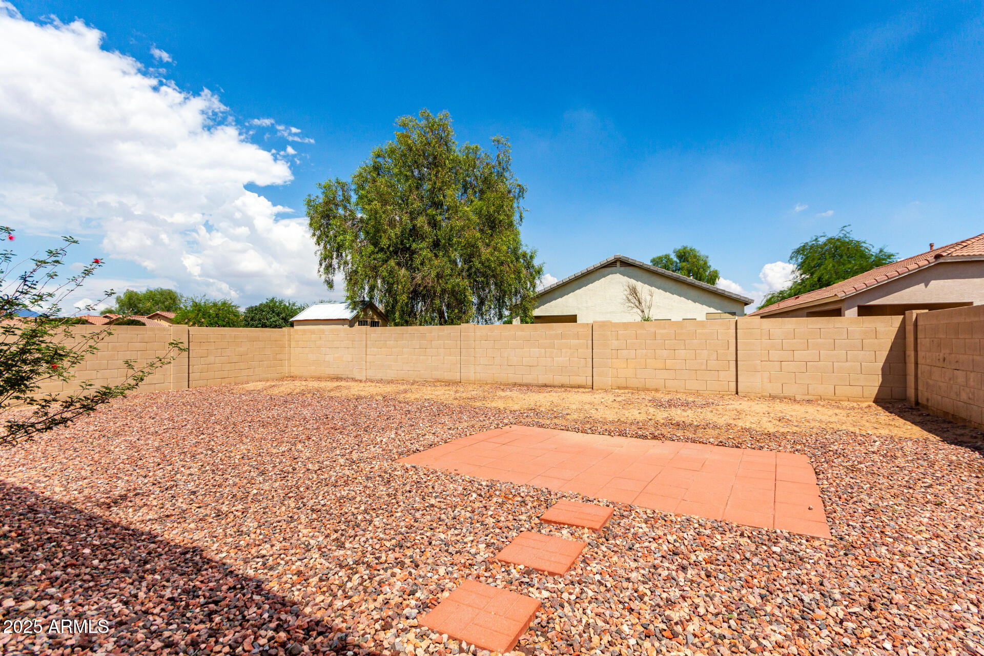 44922 Alamendras Street Maricopa, AZ 85139 - Photo 22 of 26 a view of a backyard of the house