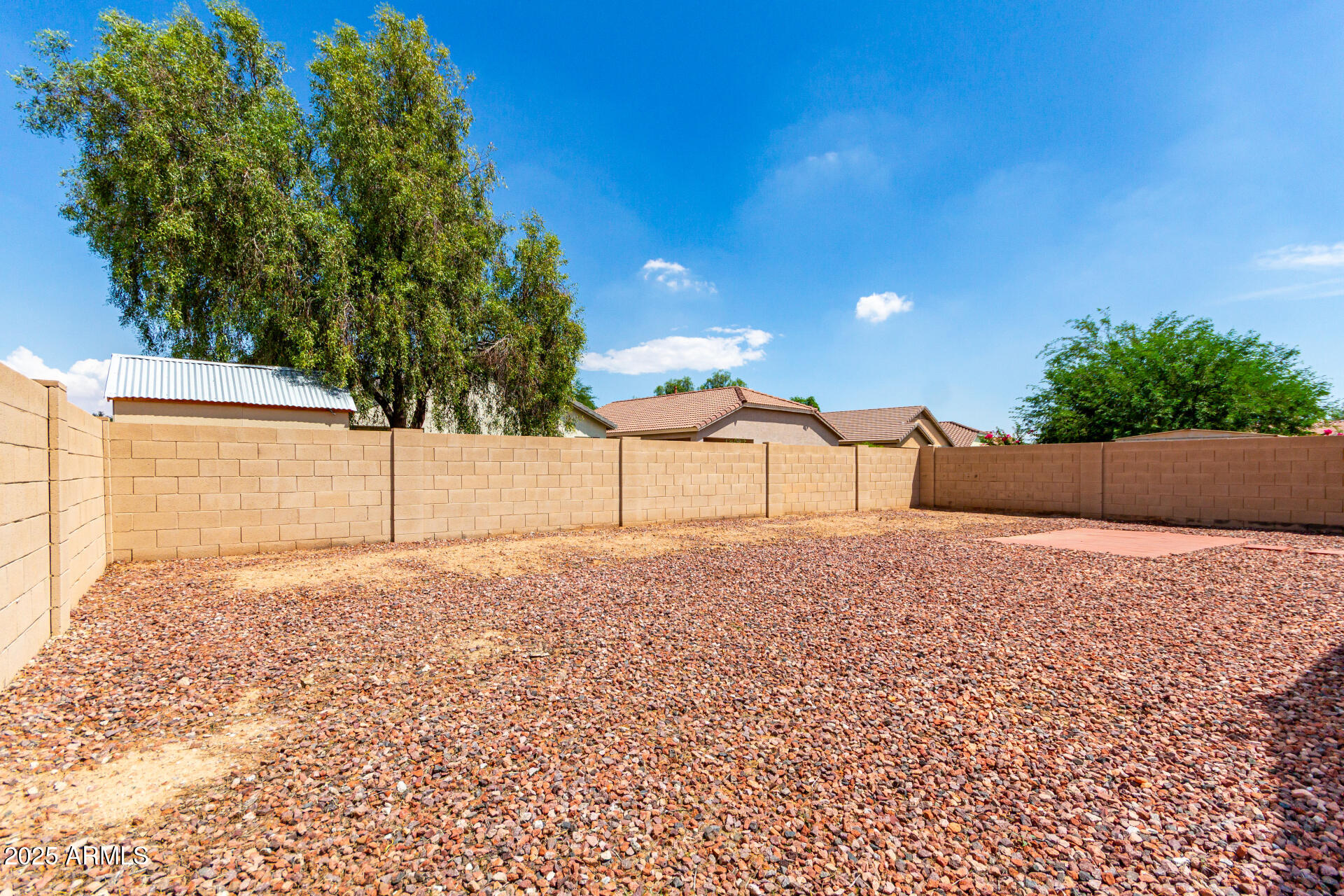 44922 Alamendras Street Maricopa, AZ 85139 - Photo 25 of 26 a view of a backyard of the house