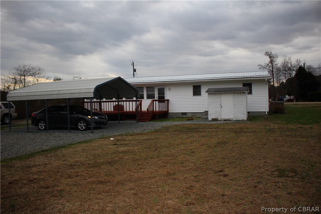 1174 North River Road Bohannon, VA 23021 - Photo 3 of 35 a view of a house with a yard