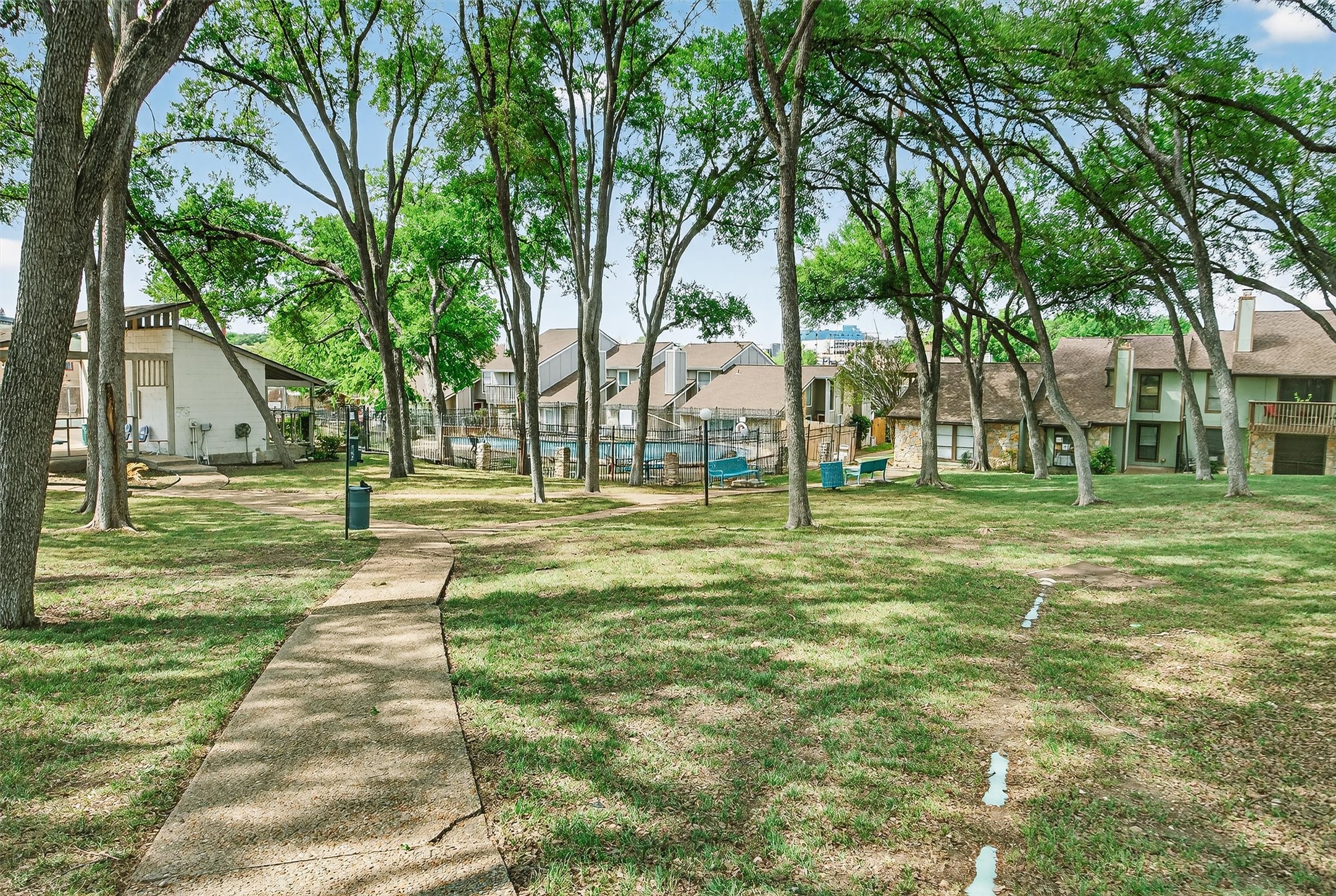 1727 Timber Ridge Drive Austin, TX 78741 - Photo 38 of 38 Community Pool and Green Space