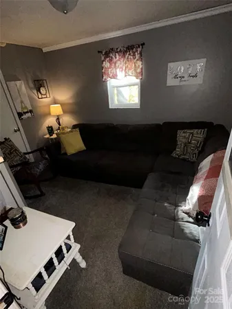 a room with furniture and a window