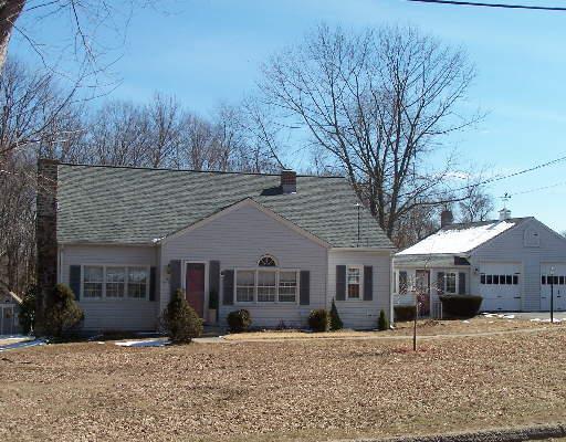 111 Mountain Road Seymour, CT 06483 - Photo 1 of 1 a front view of a house with a yard covered in snow
