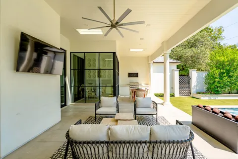 a swimming pool with chairs