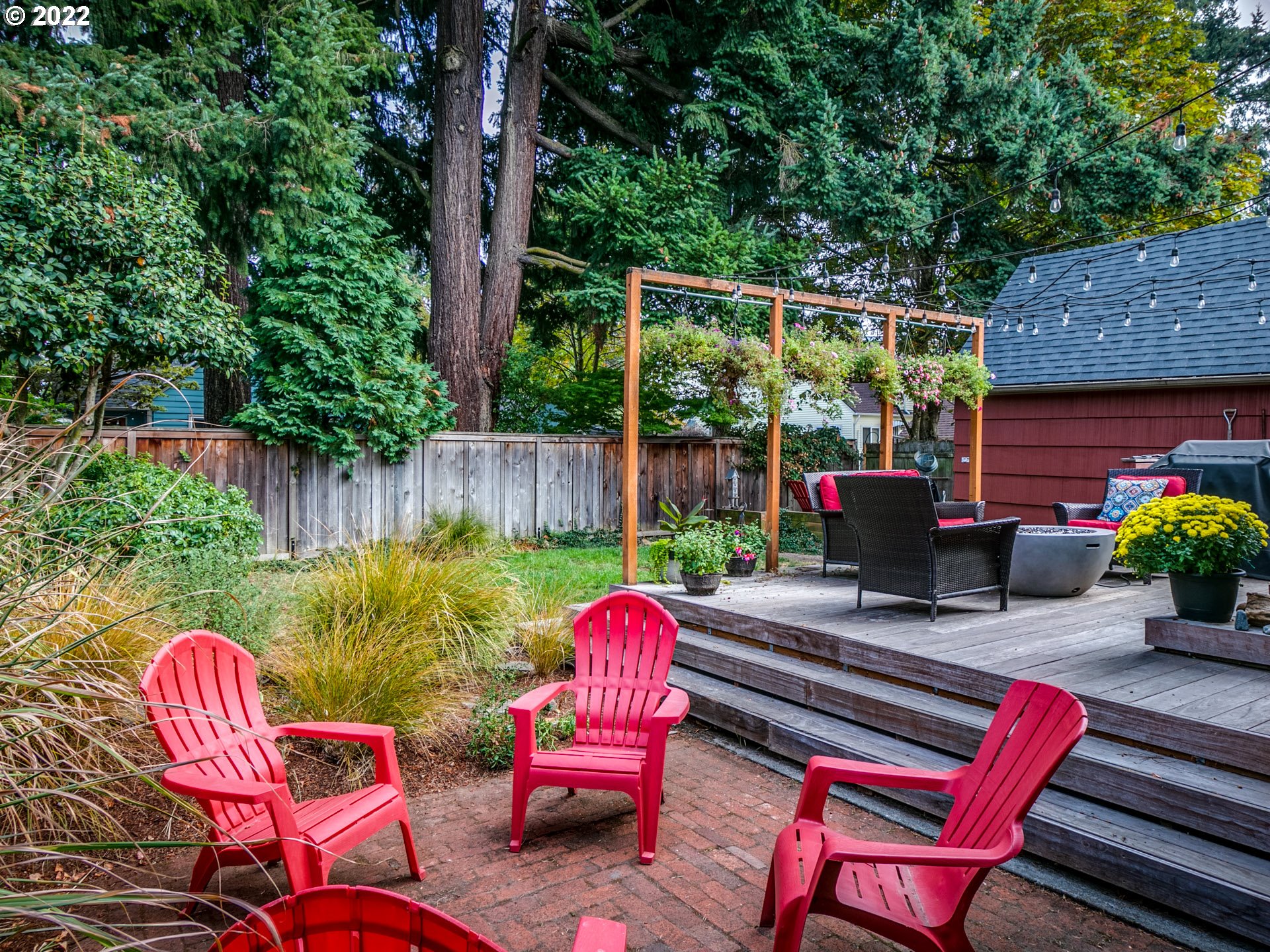 1742 Northeast 60th Avenue Portland, OR 97213 - Photo 29 of 32 a backyard of a house with outdoor seating